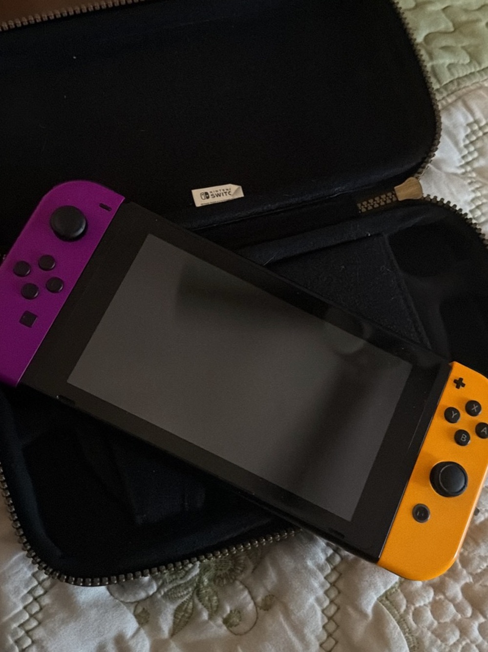 Nintendo Switch with Purple Left & Yellow Right Joy-Con
